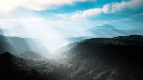 Aerial Vulcanic Desert Landscape with Rays of Light