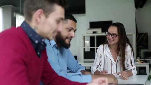 Group of Positive Business People Meeting in Office