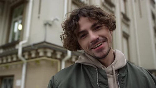 Smiling Young Man Portrait in Urban Setting