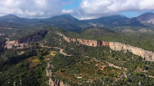 Aerial View of Mountains and Lush Green Landscape