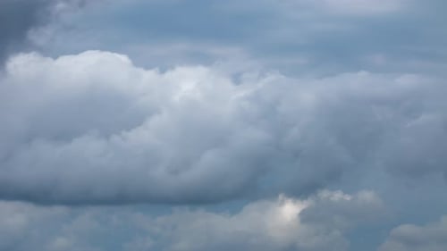Fluffy Rain Clouds Moving Fast in Time-lapse. Evening, Cloudy Heaven Background. Timelapse of