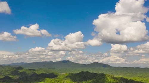 Green Mountain Range Under a Blue Sky