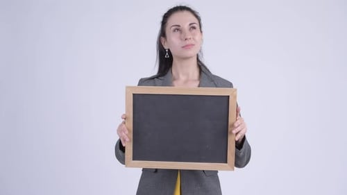 Young Woman Holding Chalkboard With Copy Space