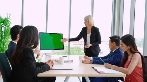 Business People in the Conference Room with Green Screen