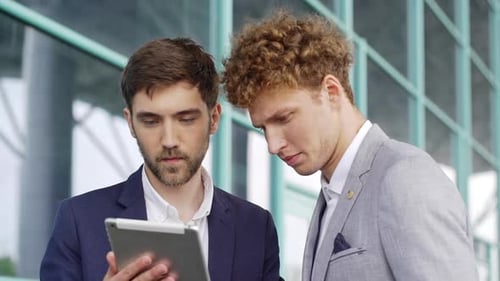Close Up of Two Salesmen in Suits Standing Outdoors Near Investor Building Offices Businessmen