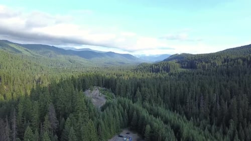 Aerial showing family camping overnight in the middle of nowhere.