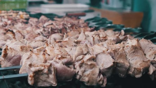 Shish Kebab is Grilled on Skewers on the Open Barbecue at the Food Court