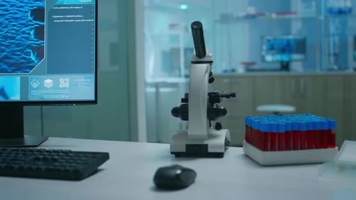 Empty Science Research Laboratory Office with Microscope on Table