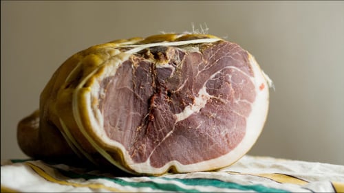 Cured Meat Bound with String on Cloth