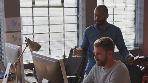 Young creative professionals working in a modern office