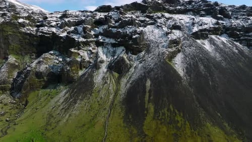 Majestic Snow-Capped Mountain Range Aerial View