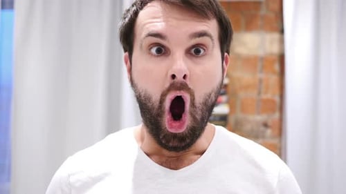 Man Expressing Surprise in Close Up