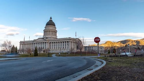 Salt Lake City capitol building with light morning traffic on a clear winter day - time lapse