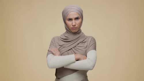 Woman Wearing Headscarf with Arms Crossed