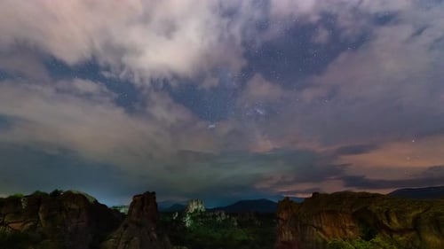 Milky Way galaxy, storm lightning, plane trails and meteor shower, during Perseid stream