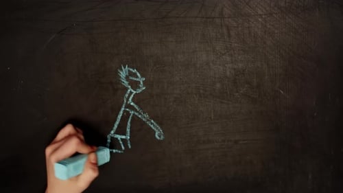 Hand Drawing Heart Over Chalkboard Couple