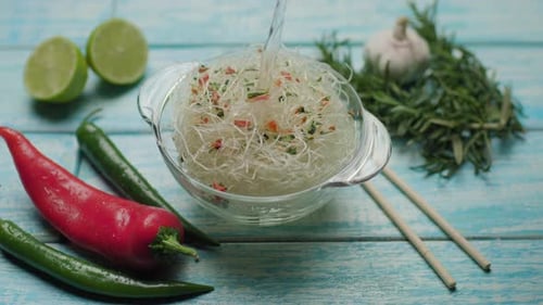 Pouring Water over Cellophane Noodles with Greenery