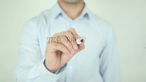 Man Writes 'Stop Racism' With Marker