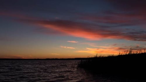 Sunrise over the Forest Lake - Time Lapse