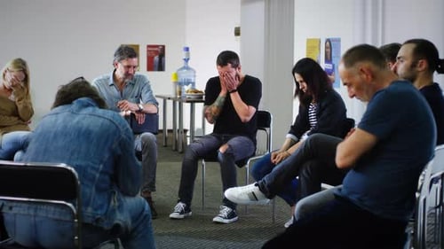 Adults Participate in Group Support Session