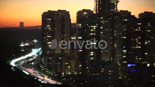 8K Day to Night Transition Time Effect at Modern Skyscrapers in Crowded City
