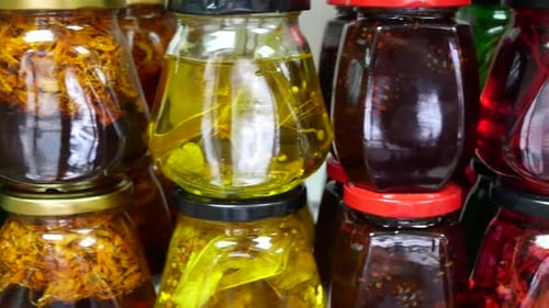 Colorful Preserved Food Ingredients Stacked in Jars