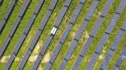 Aerial view of solar power plant field. Electrical photovoltaic panels for producing clean ecologic