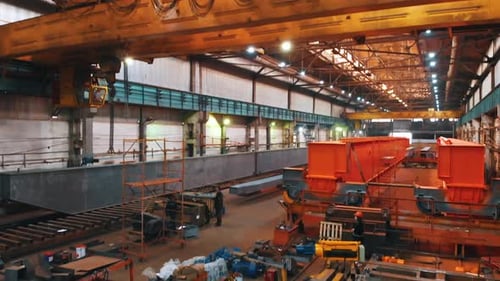 Factory for the Construction of Orange Lifting Cranes