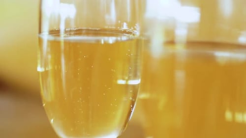 Elegant Champagne Flutes with Sparkling Wine Close-Up