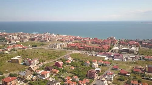 Aerial view of Sunny Beach city that is located on Black Sea shore. Top view of sand beaches