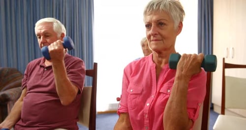 Seniors Group Workout with Dumbbells