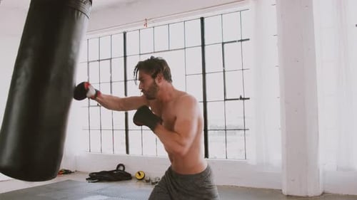 Athletic Man Boxing Punching Bag for Fitness