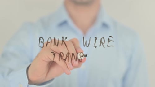 Bank Wire Transfer, Man Writing on Transparent Screen