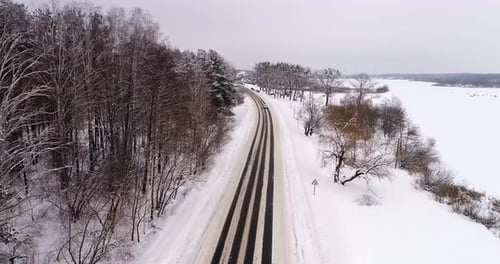 Aerial View of the Snow Road in Winter