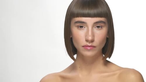 Stylish Woman Posing Against White Background