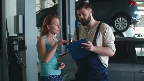 Woman at Auto Repair Garage