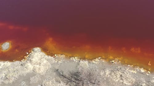 Polluted coastal area of open mine acid drainage 4K drone video