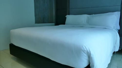 Hotel Bedroom Featuring a King Size Bed