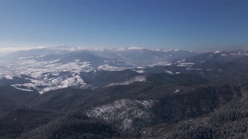 Scenic Landscape of Winter Carpathians Forest and Mountain Valleys Aerial Drone View Video