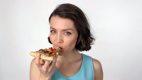 Woman Eating Delicious Pizza Slice on White Background