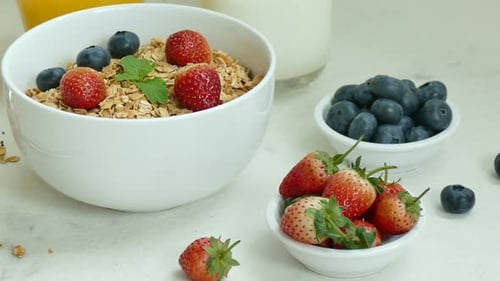 Breakfast Granola with Fresh Berries and Milk