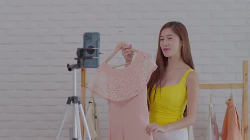Fashionable Woman Films Clothing Vlog Indoors
