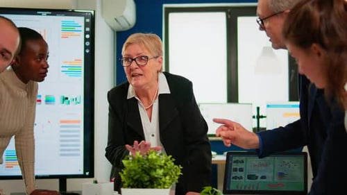 Business Team Meeting in Modern Corporate Office