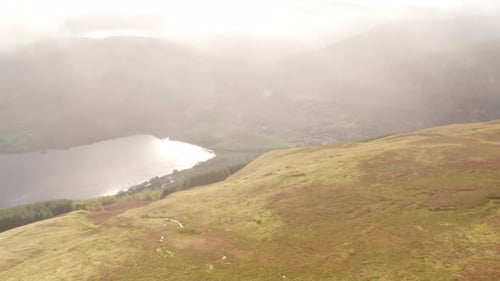 Drone Panning To the Left, Capturing the Mountain Ranges and the River Below