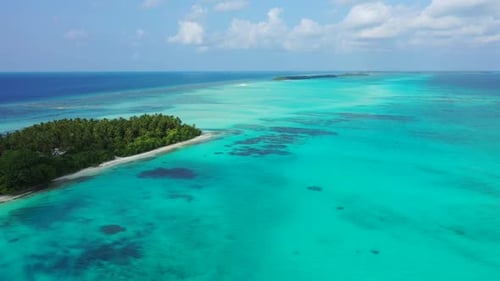 Aerial flying over sky of perfect lagoon beach holiday by aqua blue sea with white sand background o