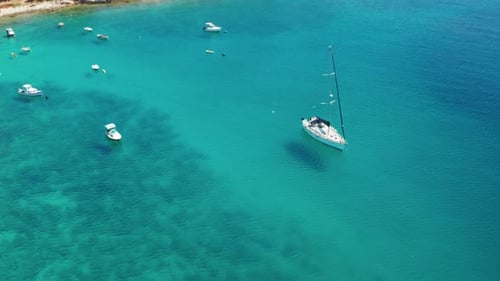 Modern Yacht and Motorboats Drift on Azure Sea Water