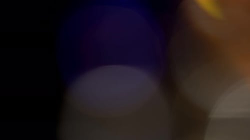 Multicolored Light Leaks Footage on Black Background Stylizing Video Transitions Bokeh Effect
