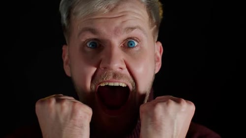 Man Shouting with Excitement in Close Up