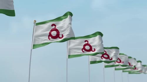 Realistic Waving Flags of Ingushetia Against Blue Sky