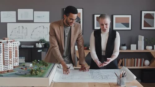 Manager and Architect Working